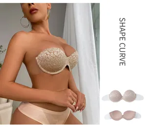 Detailed view of strapless backless invisible bra with floral lace cups and clear side wings.