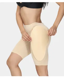 Close-up detail view of high waist padded shapewear shorts featuring removable hip enhancement pads.