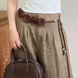 Bohemian vintage rose flower waist chain for women, beaded braided rope belt with tassels.