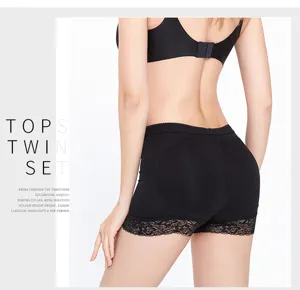 Back detail of black women shaping shorts with lace hem and hip lifting pad design.