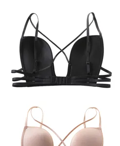 Detail shot of women push-up deep U bra with sexy cross back straps, black and nude color.