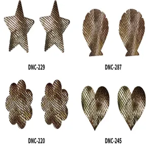 Detail view of metallic mesh pasties showcasing star shell flower and heart shapes.