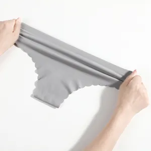 Women's low-waist seamless ribbed thong underwear, breathable solid color stretchy briefs.