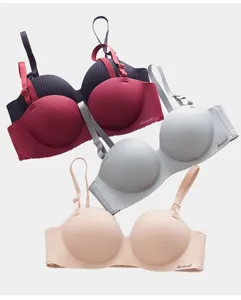 Seamless wireless push-up bra with double straps and striped design for comfortable daily wear.