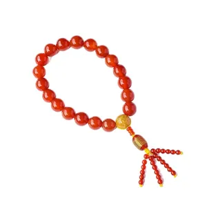 Natürlicher roter Achat Perlen Armband Auto Anhänger mit goldenen Perlen und Quaste.
