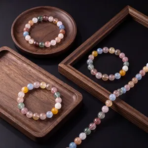 Natural multi-color crystal gemstone beaded bracelet set with macaron shades, elegant display.