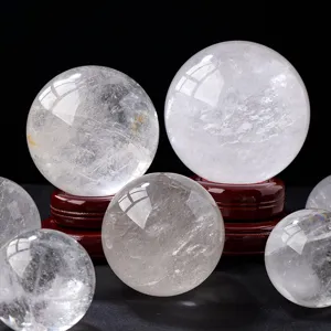 Natural clear quartz crystal sphere feng shui ball for home decor and wealth manifestation.