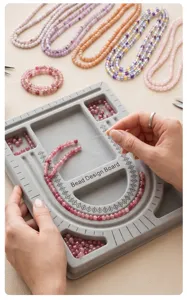 DIY gemstone bead design board set with colorful crystal loose beads for making handmade jewelry.