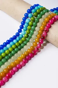 Colorful agate gemstone round beads detail closeup jewelry making DIY bracelet necklace parts