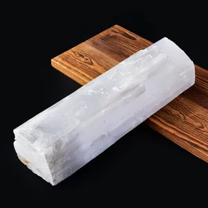 Close-up of natural white selenite crystal raw stone texture detail for home decor.
