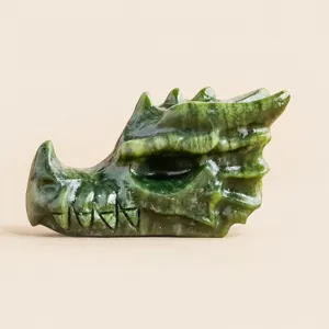Natural serpentine jade dragon head carving ornament, exquisite crystal animal figurine decor.