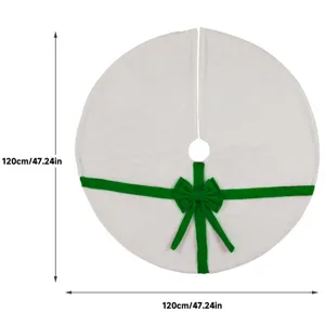 White plush Christmas tree skirt detail showing green bow ribbon and 120cm sizing dimensions.