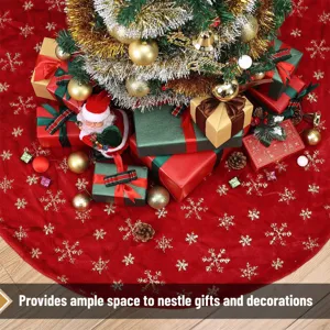Red plush Christmas tree skirt with glittering sequin snowflakes for festive holiday decor.
