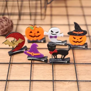 Joli ensemble de pinces à cheveux Halloween pour enfants, motifs chauve-souris et citrouille.