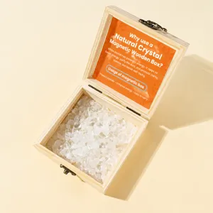 Wooden crystal demagnetization box with glass window and white crystal chips, detail display