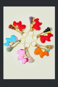 Crystal gourd horse leather keychain bag charm pendant detailed view vibrant colors.