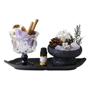 Set de aromaterapia de piedra de cristal natural con copa de vidrio y aceite.