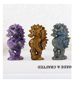 Close-up view of natural crystal seahorse carving, exquisite mineral stone sculpture detail.