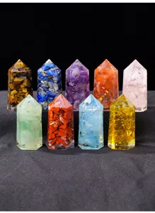 Detail view of colorful resin crystal gravel hexagonal pillars for meditation and yoga decor.