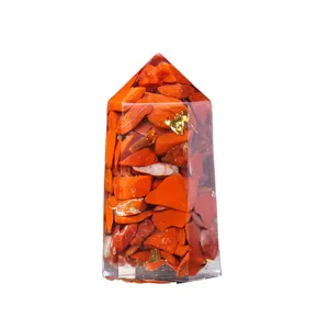 Red crystal gravel resin hexagonal energy column pillar for yoga meditation and decoration.