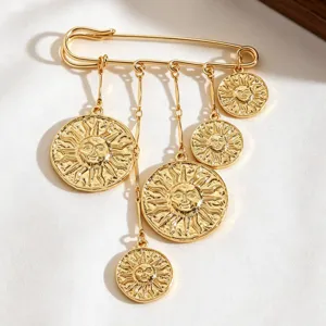 Detaillierte Ansicht der goldenen Vintage-Brosche mit fünf hängenden Sonnenanhängern