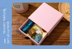 Detailed shot of natural crystal raw stone gift set box, mineral specimen display piece.