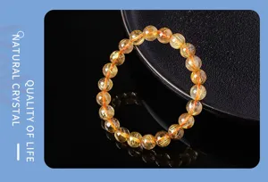 Natural rutilated quartz crystal bracelet gemstone golden hair luxury jewelry accessory.