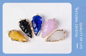 Crystal arrow pendant detail showing colorful gemstone necklace jewelry accessories.