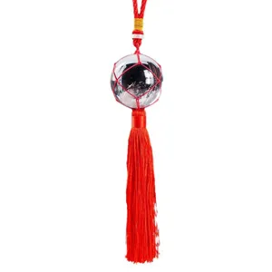 Natural white crystal ball with red tassel hanging ornament for car rearview mirror decor.
