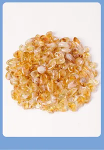 Piedras rodadas de citrino natural de Brasil en detalle para acuario y decoración.