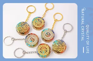 Natural crystal stone orgone keychain with sacred geometry symbols for bag and car decor.