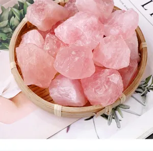 Raw pink quartz crystal detail, natural crystal stones for home decor, healing stone specimens.