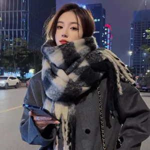 Women's thick warm plaid cashmere-feel winter scarf, classic black and white grid style.
