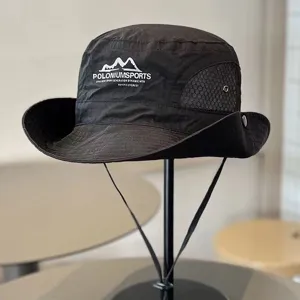 Black outdoor hiking sun hat with chin strap, breathable mesh, and mountain logo print.