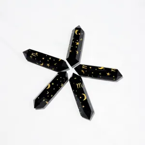 Natural obsidian double terminated crystal pillar with laser engraved zodiac star pattern.