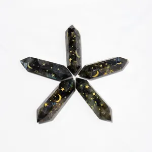 Natural labradorite double terminated crystal points set with engraved zodiac stars symbols.