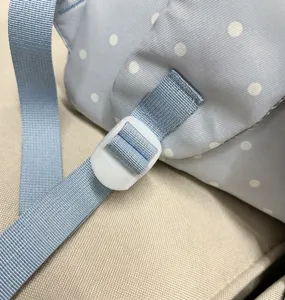 Adjustable shoulder strap detail of the cute Japanese style polka dot student backpack.