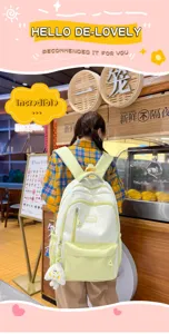 Cute casual canvas student backpack with color block design, large capacity for daily use.