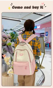 Detailed lifestyle scene featuring a cute contrast color student backpack with stars.