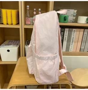 Casual Japanese style pink school backpack for girls and students, lightweight and practical.