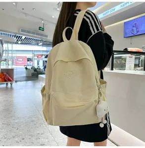 Casual Japanese style campus backpack for women and girls, lightweight school bookbag for travel.