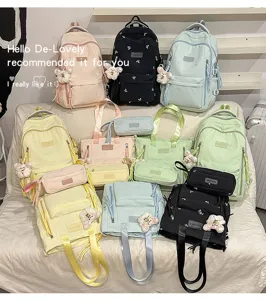 Large capacity school backpack set with matching tote and pencil case in pastel colors.