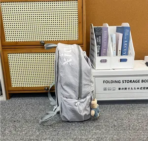 Casual nylon school backpack in grey, lightweight commuter daypack for daily use.