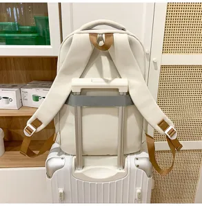 Large capacity casual school backpack for women and students, perfect travel daypack with strap.