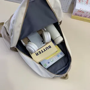 Casual minimalist Japanese style backpack capacity display with compartments for daily use.