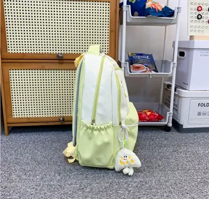 Casual color-blocking college student backpack with large capacity and cute side pocket design.