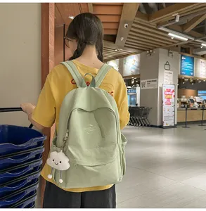 Casual canvas backpack for women, lightweight green school bookbag with cute cloud pendant for daily.
