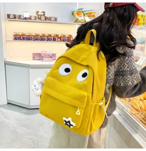 Cute yellow corduroy backpack for women, large capacity casual student school bag.