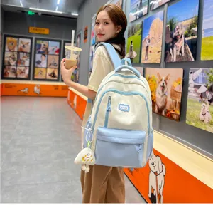 Cute college student backpack with star pattern, color-block design, large capacity and casual style.