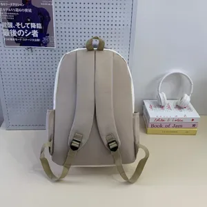 Casual minimalist student backpack with straps, lightweight beige daily school bag for teens.